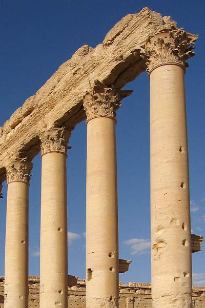 Image was here of four pillars, also known as collumns. These are ancient temple ruins from syria.